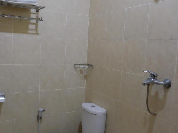 Puri Minggiran Guest House : photo 5 de la chambre chambre double Économique