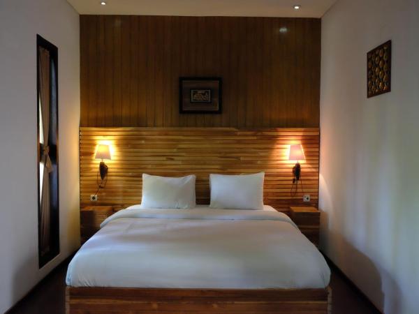 Puri Minggiran Guest House : photo 3 de la chambre chambre double Économique