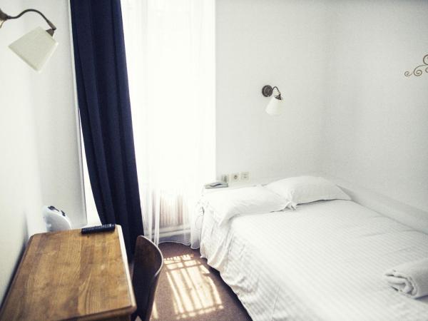 The Old Hotel Ravel Centre : photo 2 de la chambre chambre simple avec accès gratuit au jacuzzi