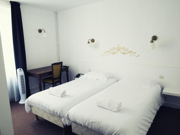 The Old Hotel Ravel Centre : photo 4 de la chambre chambre lits jumeaux avec accès gratuit au jacuzzi