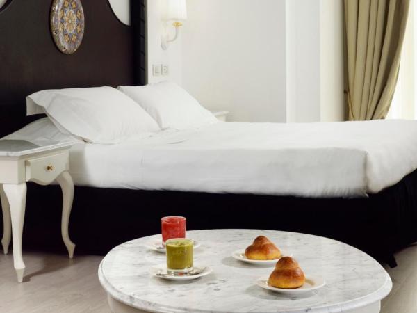 Palace Catania | UNA Esperienze : photo 3 de la chambre chambre double premium avec canapé-lit