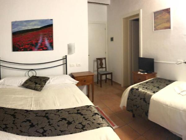 Villa Tuscany Siena : photo 10 de la chambre chambre triple