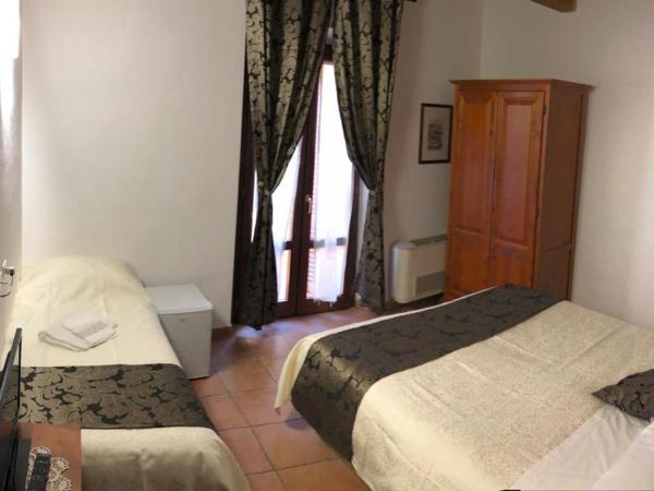 Villa Tuscany Siena : photo 8 de la chambre chambre triple