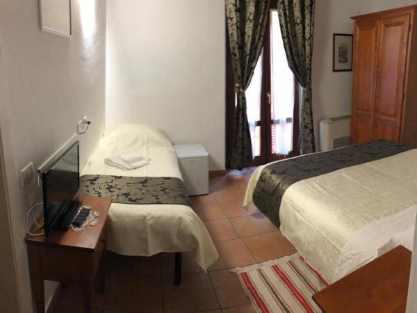 Villa Tuscany Siena : photo 7 de la chambre chambre triple