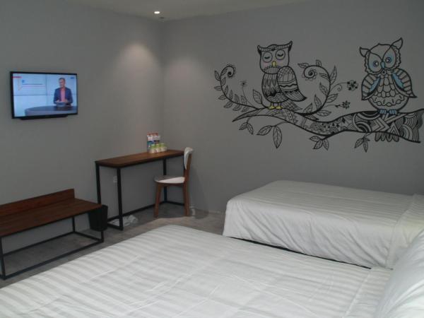 Nite & Day Surabaya - Kedungdoro : photo 2 de la chambre chambre familiale deluxe