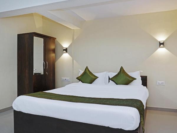 Treebo Lotus Baner : photo 2 de la chambre [sanitized] standard double room