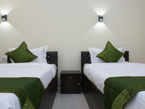 Treebo Lotus Baner : photo 7 de la chambre [sanitized] standard double room