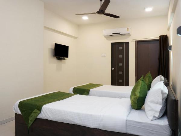 Treebo Lotus Baner : photo 10 de la chambre [sanitized] standard double room