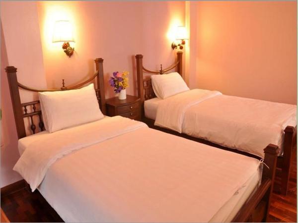 Sourire at Rattanakosin Island Hotel : photo 1 de la chambre chambre lits jumeaux deluxe