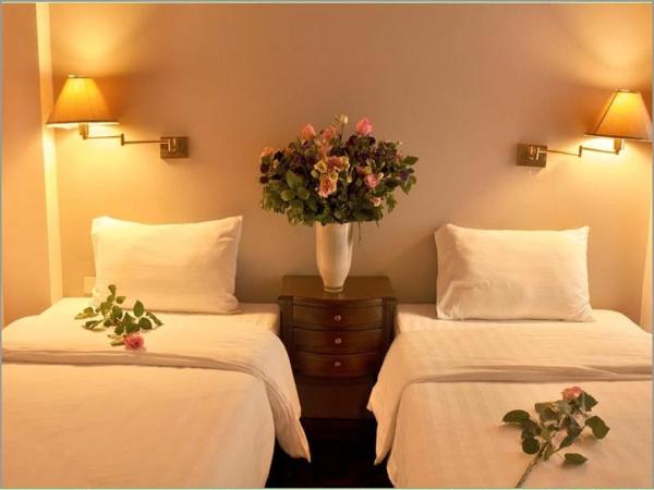 Sourire at Rattanakosin Island Hotel : photo 1 de la chambre chambre lits jumeaux supérieure