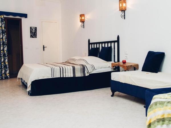 Résidence Le Ruisseau : photo 1 de la chambre chambre triple avec balcon