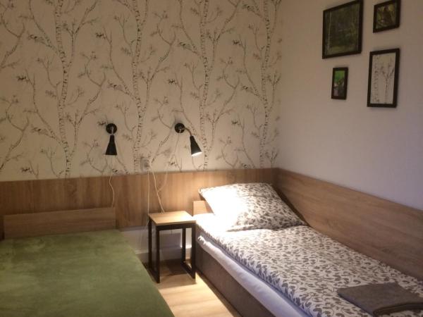 Kathia Pokoje Gościnne : photo 1 de la chambre chambre lits jumeaux avec salle de bains