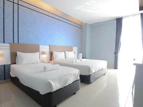 Suite Dreamz Hotel : photo 1 de la chambre chambre triple avec vue