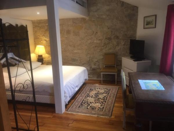 Chambres d'hôtes La Catounière : photo 1 de la chambre chambre double deluxe avec lit d'appoint