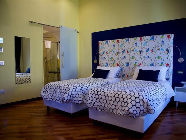 Il Giardino Segreto : photo 3 de la chambre chambre deluxe double ou lits jumeaux