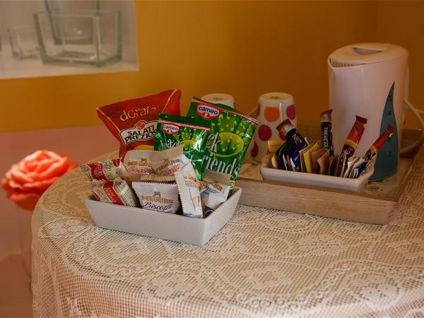 Il Giardino Segreto : photo 3 de la chambre chambre double ou lits jumeaux supérieure - vue sur jardin