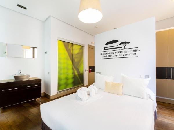 Madrid House Rooms : photo 1 de la chambre chambre lit queen-size avec baignoire spa