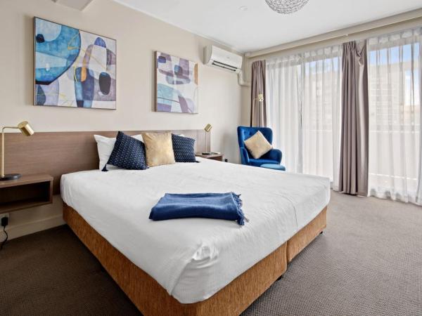 The Metropolitan Spring Hill : photo 3 de la chambre suite lit king-size