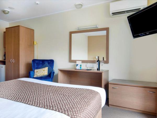 The Metropolitan Spring Hill : photo 2 de la chambre hébergement lit queen-size metro