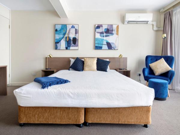 The Metropolitan Spring Hill : photo 1 de la chambre suite lit king-size