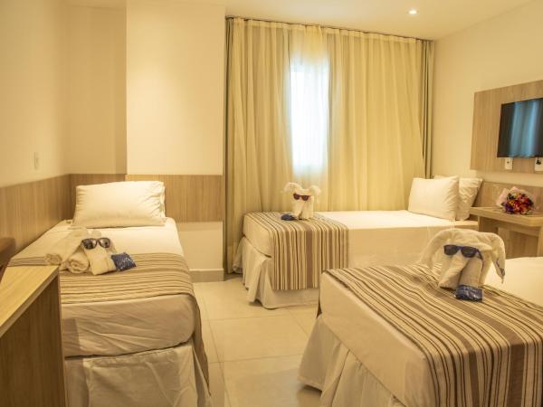 Aquidabã Praia Hotel : photo 8 de la chambre chambre triple de luxe