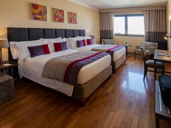 Hotel Grand Brizo Buenos Aires : photo 1 de la chambre chambre supérieure avec 2 lits queen-size