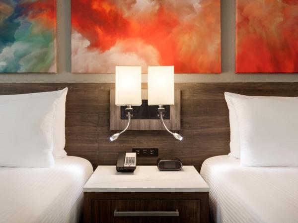 Buena Vista Suites Orlando : photo 2 de la chambre suite 1 chambre avec 2 lits queen-size et canapé-lit