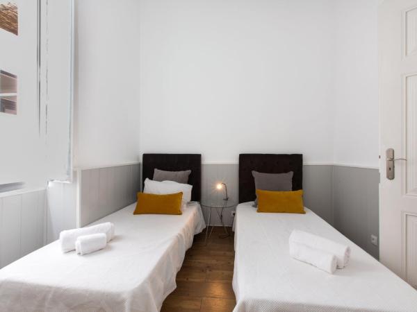 Faro Cosy Guesthouse : photo 7 de la chambre chambre double ou lits jumeaux avec salle de bains commune