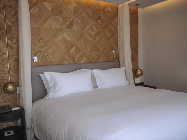 Sofitel Marrakech Palais Impérial & Spa : photo 3 de la chambre suite lit king-size agdal prestige avec balcon - vue sur montagne ou piscine