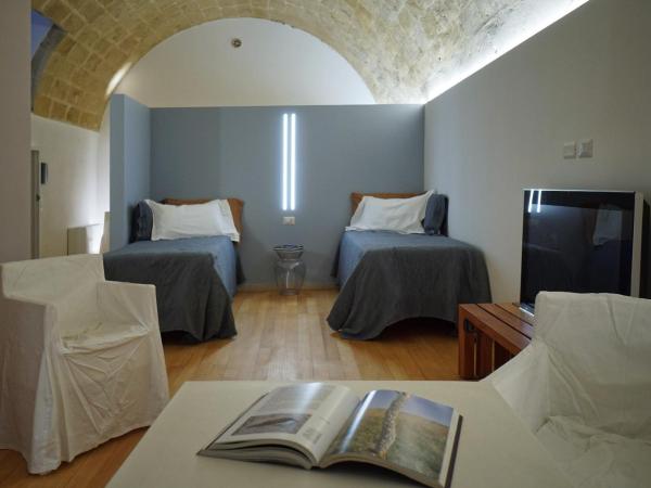 Il Carrubo residenza Walk&Stay : photo 2 de la chambre chambre familiale supérieure