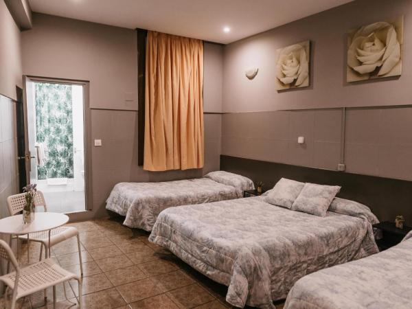 Pensión 45 : photo 1 de la chambre chambre triple