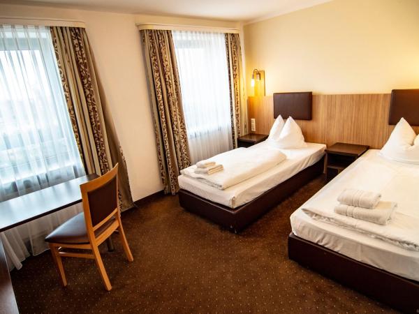 Ausbildungshotel St. Theresia : photo 2 de la chambre chambre double ou lits jumeaux avec salle de bains privative