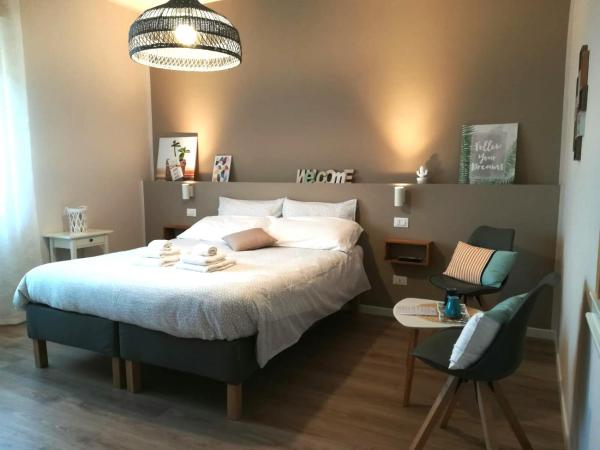 L'Ulivo : photo 2 de la chambre chambre double ou lits jumeaux avec lit d'appoint