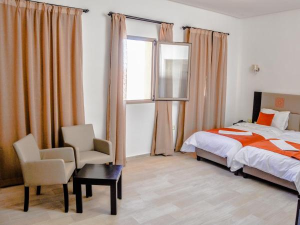 Motel Safari Budget : photo 9 de la chambre chambre double ou lits jumeaux