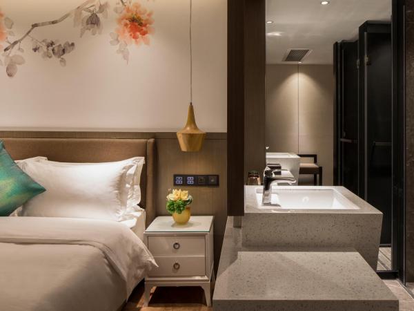 Paco Hotel Dongpu Guanghzou -Free Shuttle Bus for Canton Fair : photo 2 de la chambre chambre double