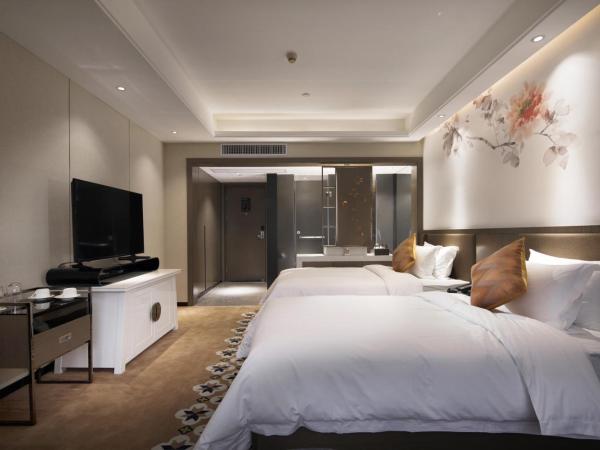 Paco Hotel Dongpu Guanghzou -Free Shuttle Bus for Canton Fair : photo 3 de la chambre chambre lits jumeaux deluxe