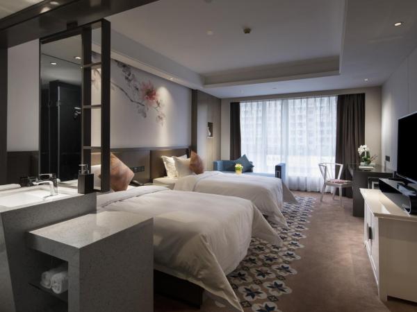 Paco Hotel Dongpu Guanghzou -Free Shuttle Bus for Canton Fair : photo 5 de la chambre chambre lits jumeaux deluxe
