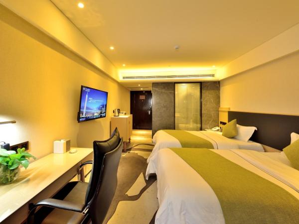 HaiJun Hotel -Free Canton Fair Shuttle Bus : photo 1 de la chambre chambre double - vue sur jardin
