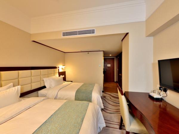 HaiJun Hotel -Free Canton Fair Shuttle Bus : photo 3 de la chambre chambre lits jumeaux supérieure avec vue sur la rivière