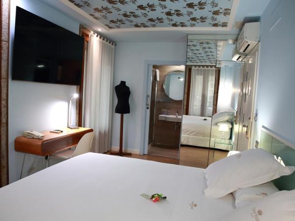 Casas Reais Boutique : photo 7 de la chambre chambre double deluxe avec balcon ou galerie