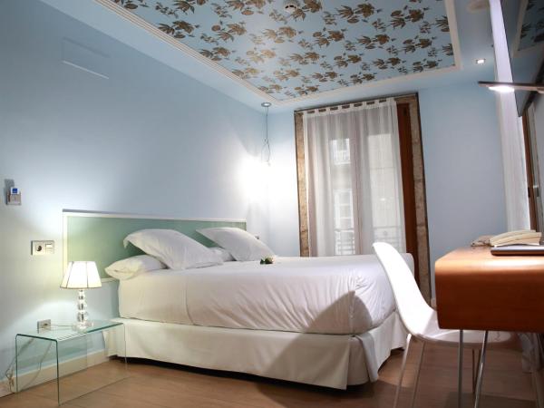 Casas Reais Boutique : photo 9 de la chambre chambre double deluxe avec balcon ou galerie