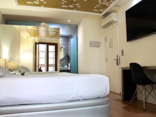 Casas Reais Boutique : photo 4 de la chambre chambre de luxe double ou lits jumeaux avec baignoire spa