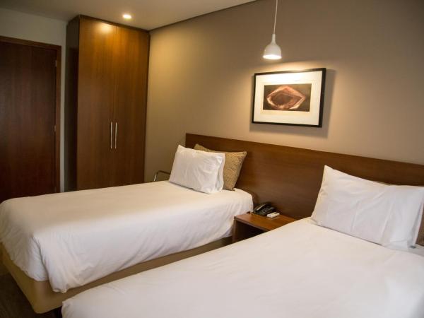 Mercure Curitiba Golden : photo 9 de la chambre chambre standard avec 2 lits simples
