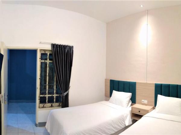 Kokonut Guesthouse : photo 1 de la chambre chambre lits jumeaux standard