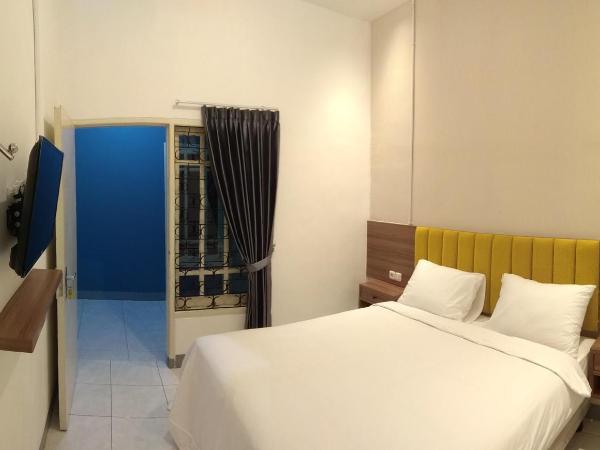 Kokonut Guesthouse : photo 2 de la chambre chambre standard lit queen-size