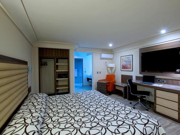 Econo Express Hotel : photo 8 de la chambre chambre double deluxe