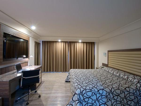 Econo Express Hotel : photo 4 de la chambre chambre double deluxe