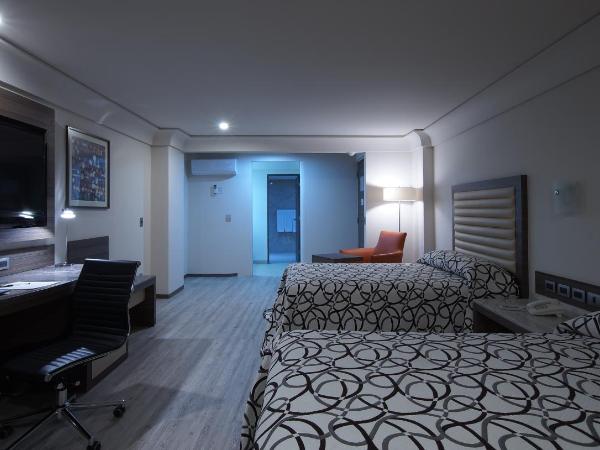 Econo Express Hotel : photo 6 de la chambre chambre lits jumeaux deluxe