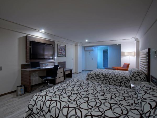 Econo Express Hotel : photo 5 de la chambre chambre lits jumeaux deluxe
