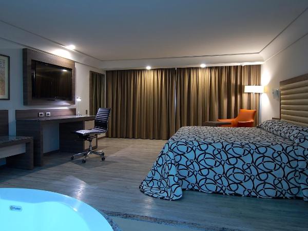 Econo Express Hotel : photo 5 de la chambre suite deluxe avec baignoire spa